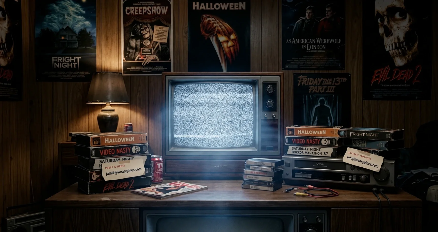 A vintage television glowing with static in a wood-panelled den full of horror posters and VHS tapes.